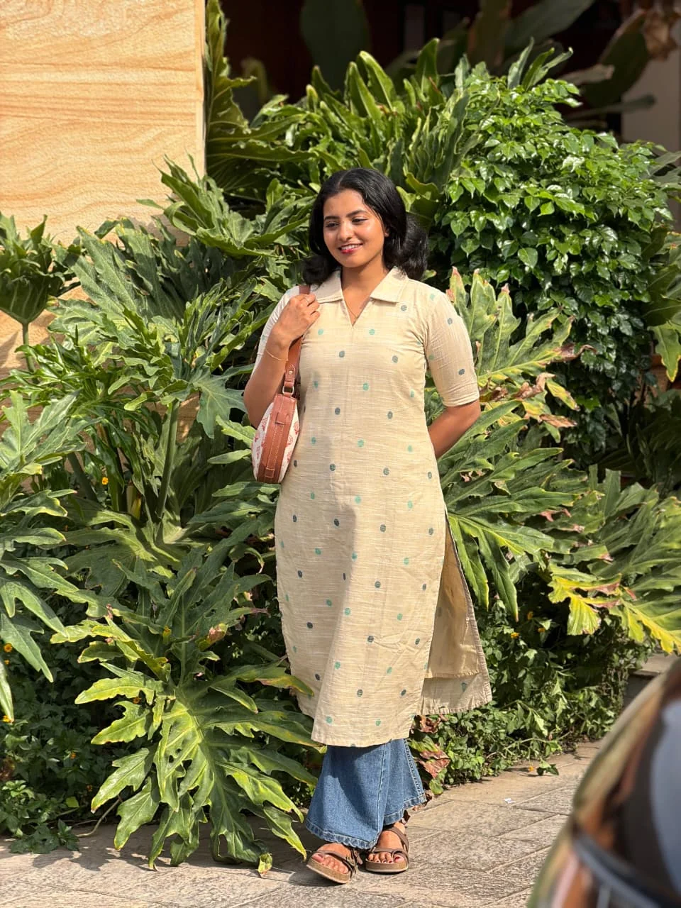 Thugil Kurta | Elegant Everyday Kurta for Women | Viyal Design Studio Woman wearing Thugil beige cotton everyday kurta with delicate motifs — Viyal Design Studio